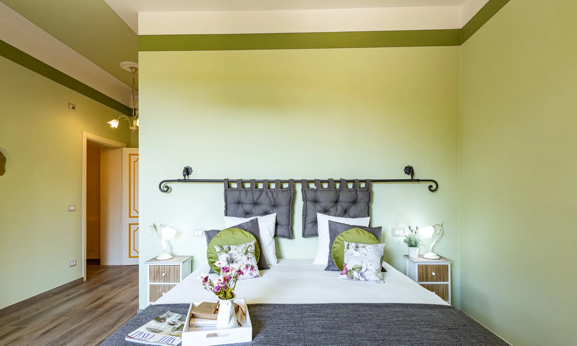 Two single beds pushed together in Camelia room at Tenuta di Macericca holiday farm